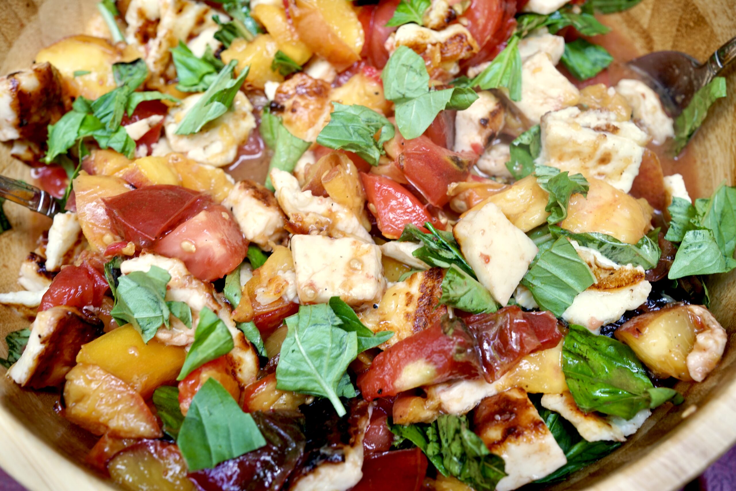 Peaches, tomato, halloumi salad