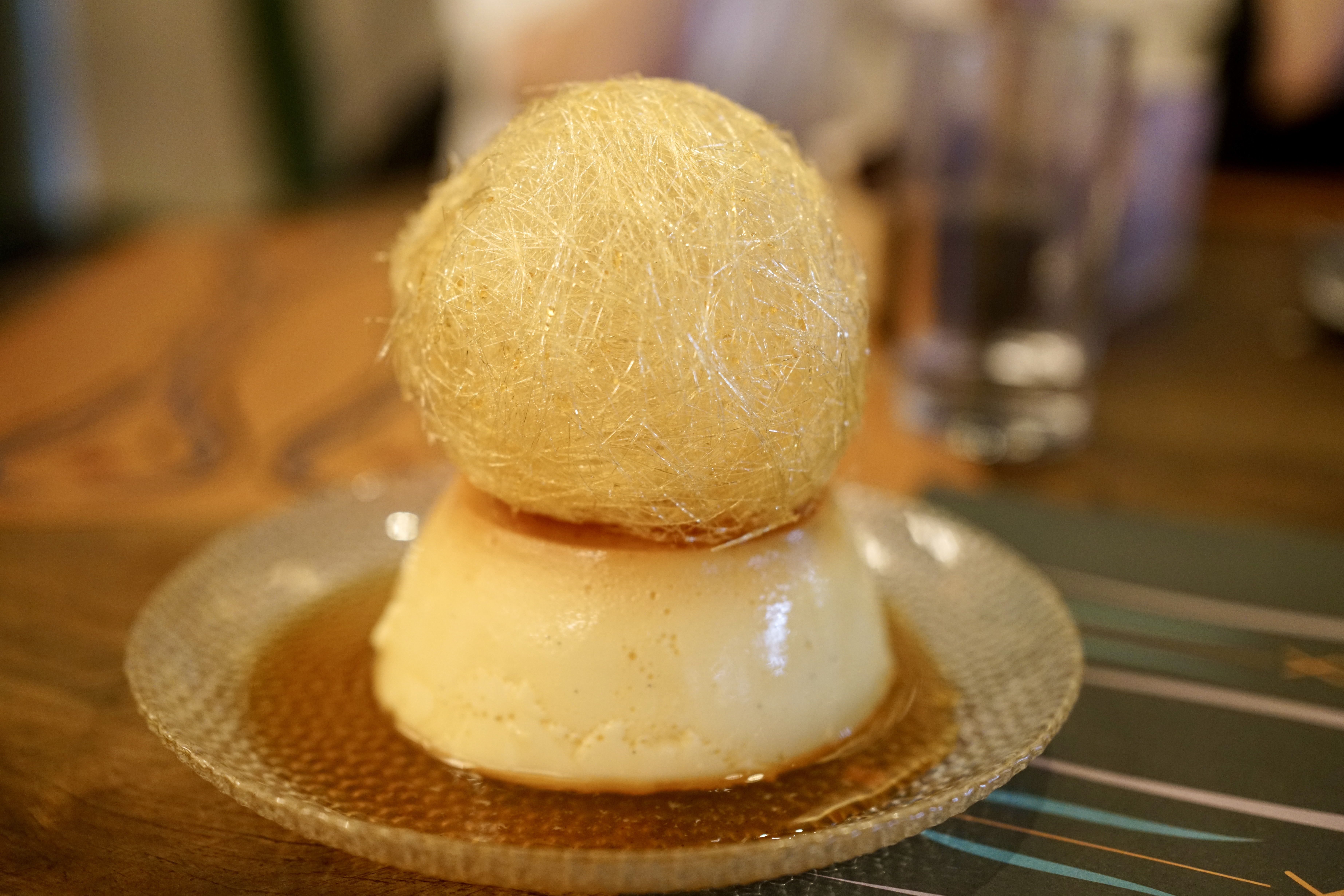 Pudim with a nest of sugar on top