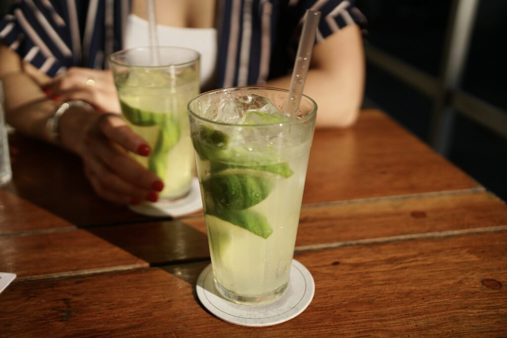 Two caipirinha cocktails in the sun