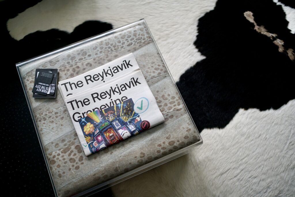 A local Reykjavík newspaper on a table in a hotel room