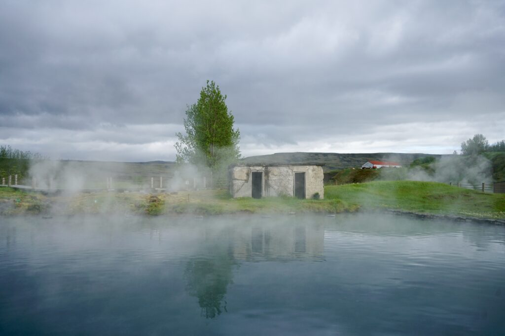 Steam rises from a natural pool in Iceland