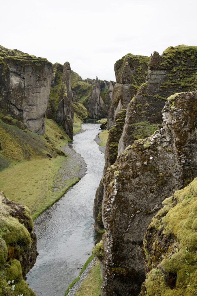The river runs through the Fjaðrárgljúfur canyon