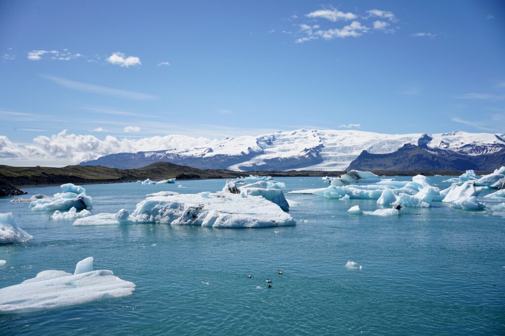 Icebergs float in the arctic blue waters of the Jökulsárlón Glacier Lagoon