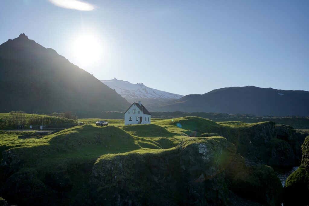 A house among rolling hills in Arnarstapi, Iceland