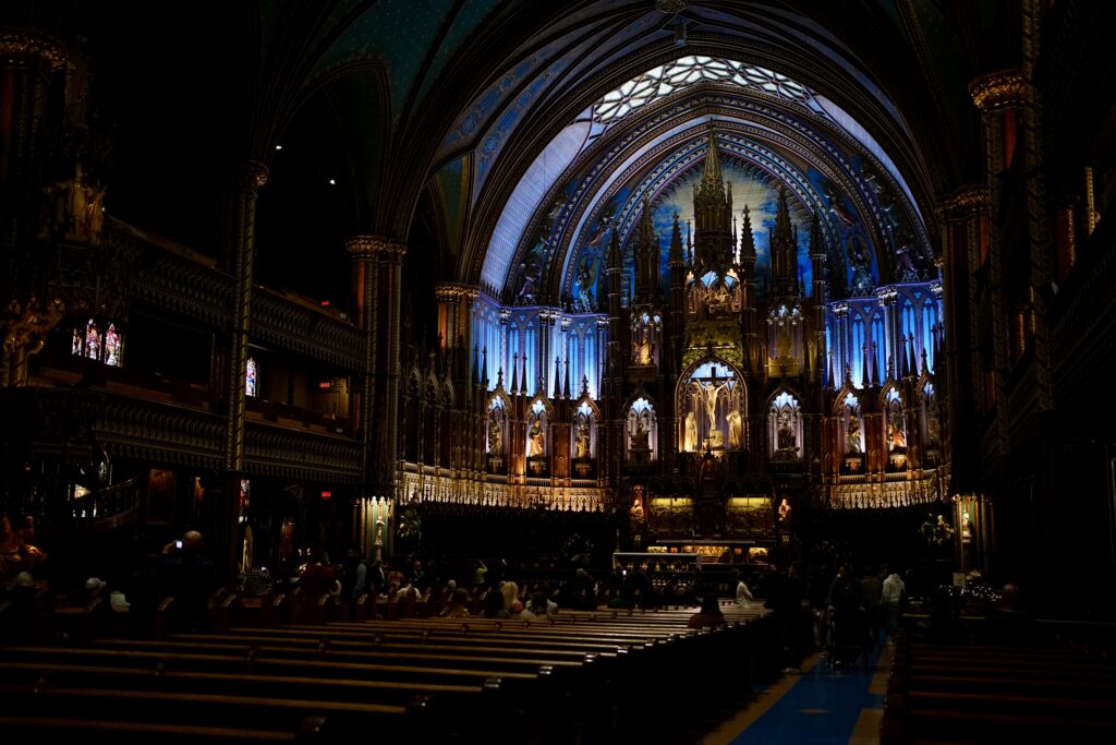 An ornate basilica with a blue glow