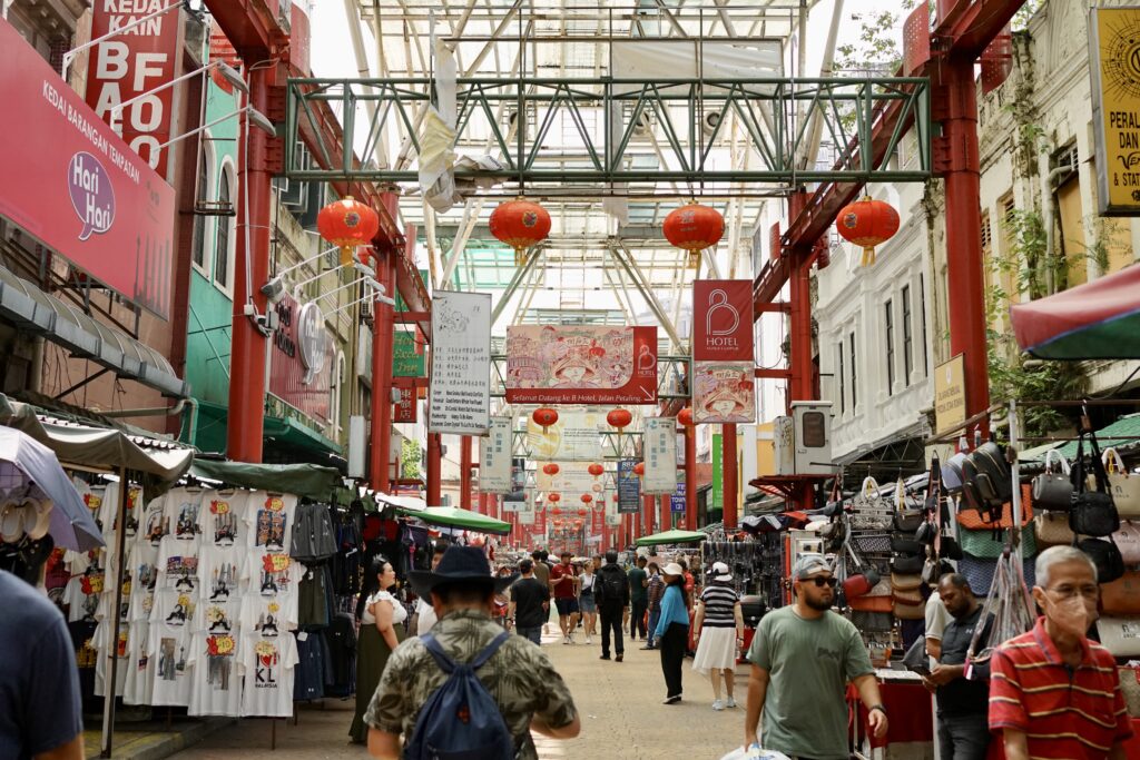 The stalls in a market with red lanterns as decorations