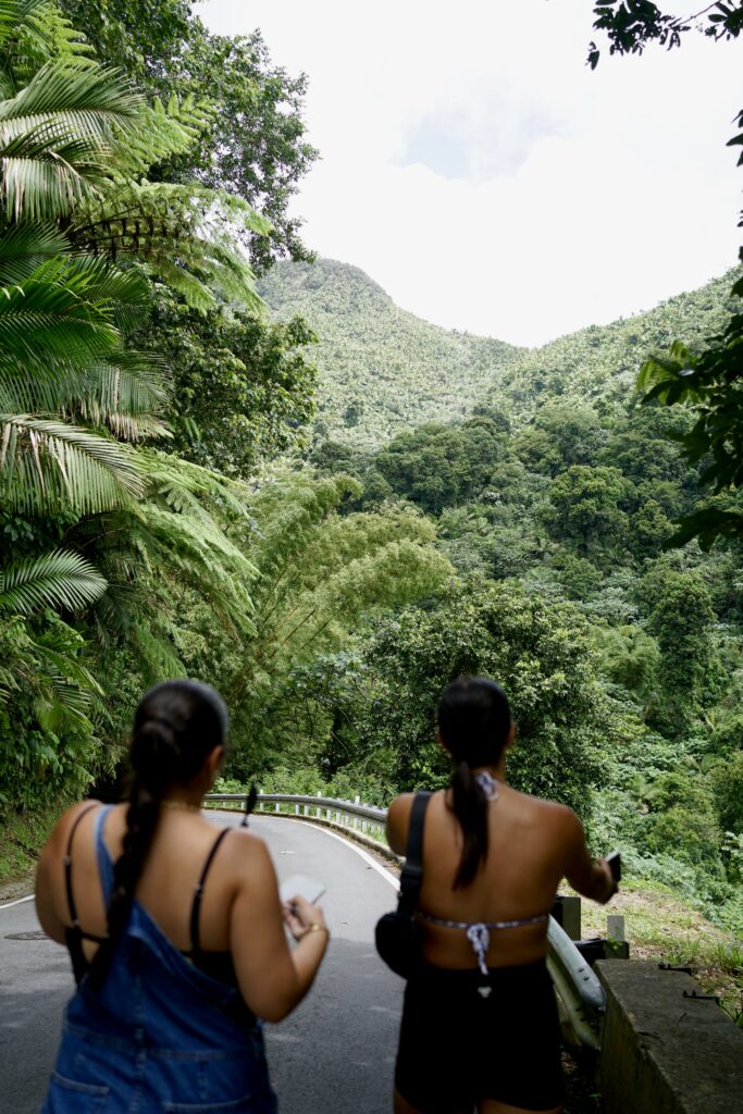 two women walking down the road in El Yunque Rainforest