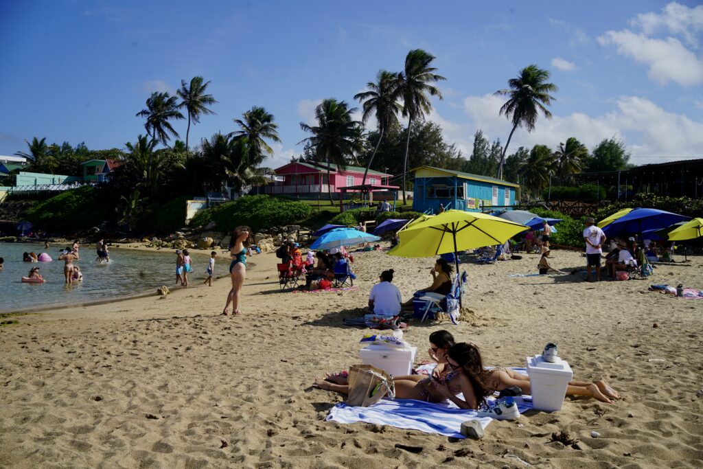 People in the sand at a beach