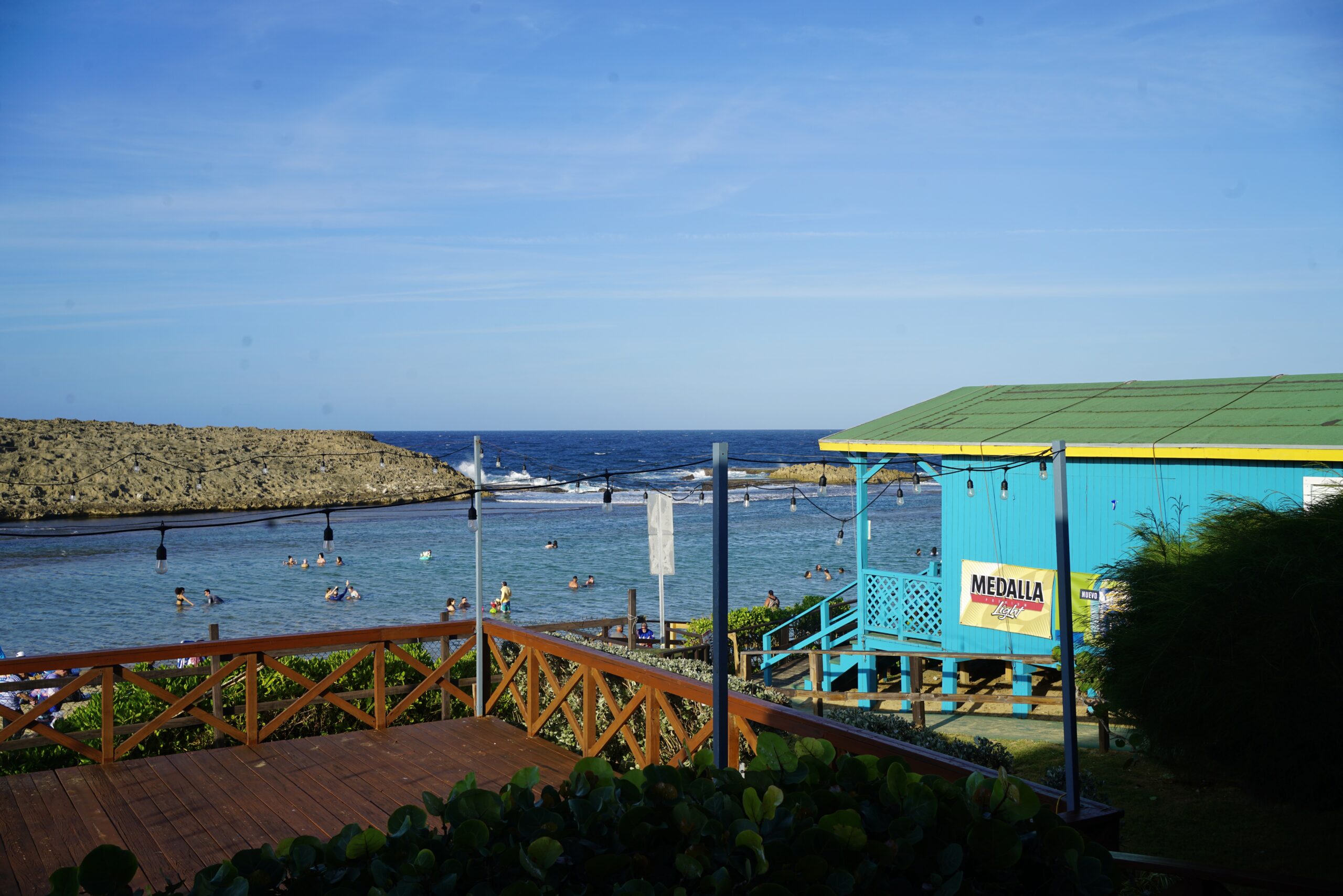 A bright blue shack near the beach in Puerto Rico