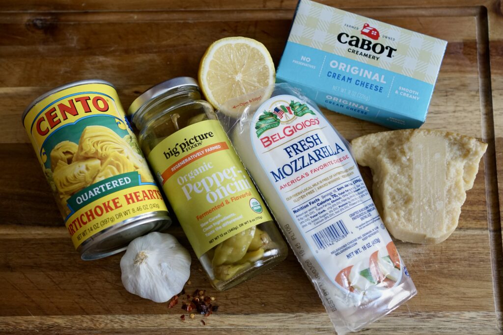 can of artichokes, garlic, lemon, mozzarella, cream cheese, parmesan